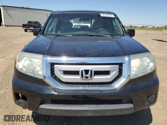 2011 Honda Pilot LX with VIN 5FNYF4H20BB502574, listed as a Copart auction lot 59156775 with 269,212 mi miles and Salvage title. Bid and sale history available at DreamBid. Image 5.