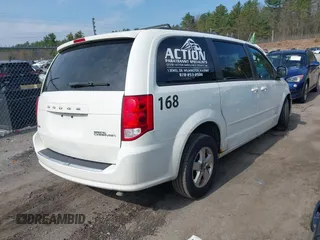 2012 Dodge Grand Caravan SXT with VIN 2C4RDGCGXCR358794, listed as a IAAI auction lot 42007316 with 212,518 mi miles and . Bid and sale history available at DreamBid. Image 4.