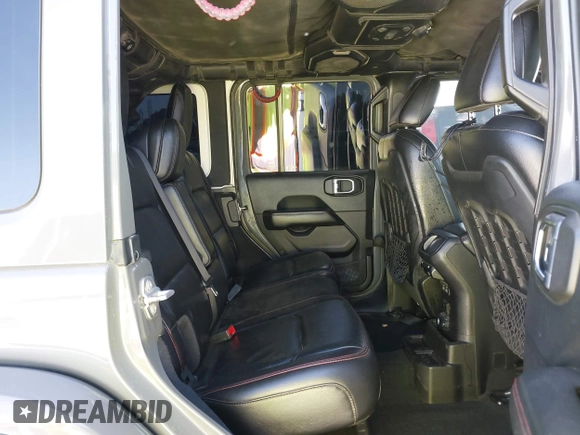 2019 Jeep Wrangler Unlimited Rubicon with VIN 1C4HJXFN6KW547401, listed as a IAAI auction lot 42250698 with 103,910 mi miles and . Bid and sale history available at DreamBid. Image 8.
