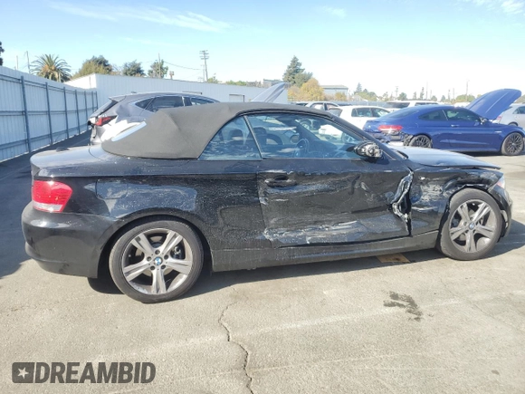 2009 BMW 1 Series 128i with VIN WBAUN13529VH81121, listed as a Copart auction lot 77849094 with 30,756 mi miles and Salvage Title. Bid and sale history available at DreamBid. Image 3.