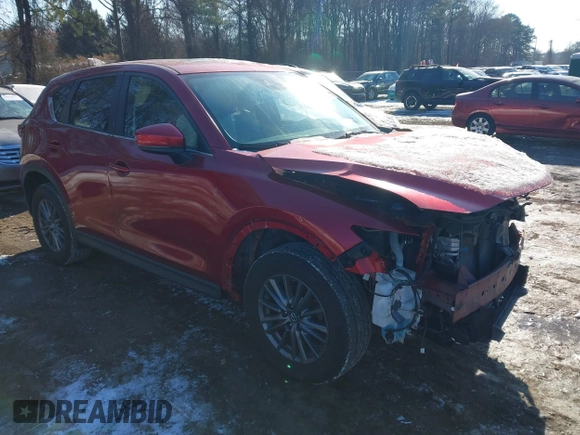 2017 Mazda CX-5 Touring with VIN JM3KFBCL1H0227290, listed as a IAAI auction lot 41400188 with 58,801 mi miles. Bid and sale history available at carsss.com. Image 1.