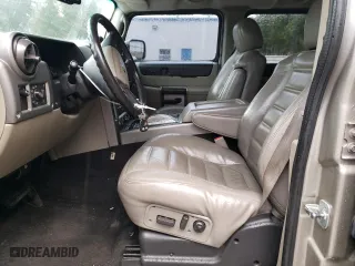 2003 Hummer H2 with VIN 5GRGN23U73H111109, listed as a Copart auction lot 76388144 with 160,179 mi miles and Salvage Title. Bid and sale history available at carsss.com. Image 7.