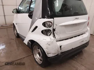 2015 Smart fortwo Passion z VIN WMEEJ3BA2FK790569, wystawiony jako IAAI lot #41598759 z przebiegiem 78 307 mil mil oraz . Historia ofert i sprzedaży dostępna na DreamBid. Obrazek 6.