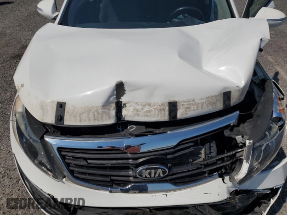 2013 Kia Sportage EX with VIN KNDPC3A2XD7392974, listed as a Copart auction lot 62603445 with 99,184 mi miles and Salvage title. Bid and sale history available at DreamBid. Image 12.