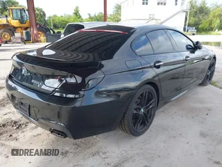 2014 BMW 6 Series 650i z VIN WBA6B2C57ED129681, wystawiony jako IAAI lot #42517803 z przebiegiem 208 644 mil mil oraz . Historia ofert i sprzedaży dostępna na DreamBid. Obrazek 4.