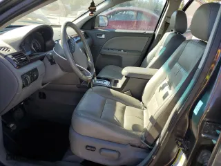 2007 Ford Five Hundred SEL with VIN 1FAHP24177G114422, listed as a Copart auction lot 77028184 with 0 mi miles and Salvage Title. Bid and sale history available at carsss.com. Image 7.