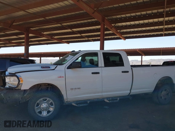 2020 Ram 2500 Tradesman z VIN 3C6UR5HJ2LG111495, wystawiony jako IAAI lot #42068717 z przebiegiem 172 052 mil mil oraz . Historia ofert i sprzedaży dostępna na DreamBid. Obrazek 14.