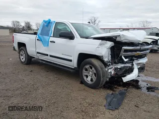 2014 Chevrolet Silverado 1500 LT with VIN 1GCVKREC2EZ390061, listed as a IAAI auction lot 40824477 with 140,928 mi miles and . Bid and sale history available at DreamBid. Image 1.