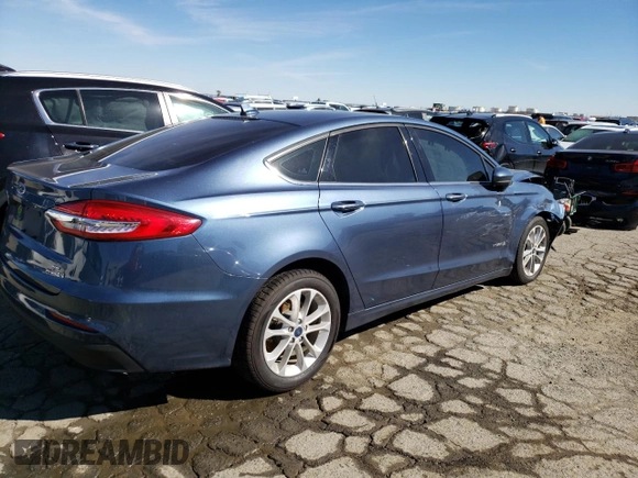 2019 Ford Fusion Hybrid SE with VIN 3FA6P0LU1KR209129, listed as a Copart auction lot 42766403 with 67,949 mi miles. Bid and sale history available at carsss.com. Image 3.