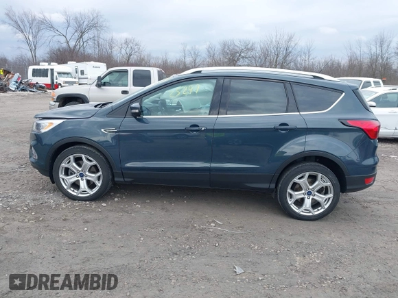 2019 Ford Escape Titanium with VIN 1FMCU9J95KUC28621, listed as a IAAI auction lot 41825297 with 60,373 mi miles. Bid and sale history available at carsss.com. Image 14.