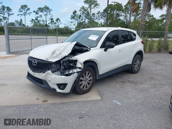 2015 Mazda CX-5 Touring with VIN JM3KE2CY8F0545967, listed as a IAAI auction lot 41909920 with 101,781 mi miles. Bid and sale history available at carsss.com. Image 17.