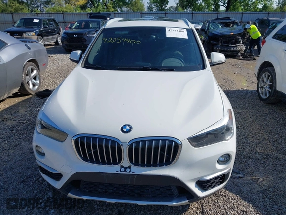 2018 BMW X1 xDrive28i z VIN WBXHT3C34J5F89162, wystawiony jako IAAI lot #42254400 z przebiegiem 131 979 mil mil oraz . Historia ofert i sprzedaży dostępna na DreamBid. Obrazek 12.