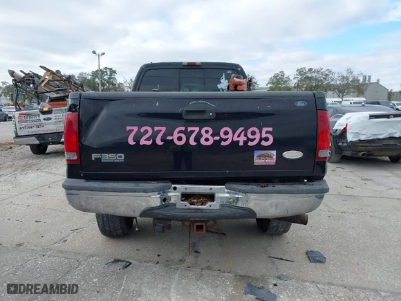 2003 Ford Super Duty F-350 SRW XL with VIN 1FTSW31P63EC30525, listed as a IAAI auction lot 41164415 with 261,844 mi miles. Bid and sale history available at carsss.com. Image 16.