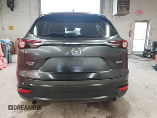 2017 Mazda CX-9 Touring with VIN JM3TCBCY1H0127229, listed as a IAAI auction lot 42320263 with 85,890 mi miles and . Bid and sale history available at DreamBid. Image 16.