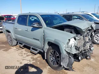 2023 Toyota Tacoma SR5 z VIN 3TMAZ5CN7PM211105, wystawiony jako IAAI lot #41433698 z przebiegiem 48 809 mil mil oraz . Historia ofert i sprzedaży dostępna na DreamBid. Obrazek 1.