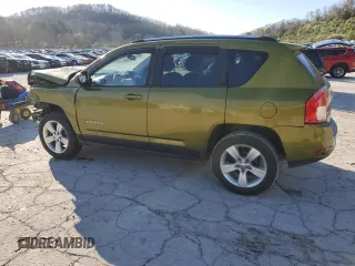 2012 Jeep Compass Latitude with VIN 1C4NJDEB6CD630669, listed as a Copart auction lot 52028235 with 124,123 mi miles and Salvage Title. Bid and sale history available at DreamBid. Image 2.