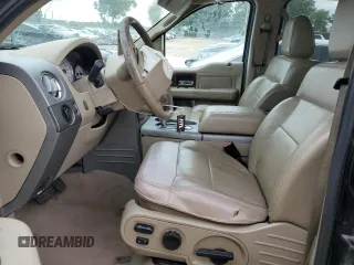 2006 Ford F-150 XLT with VIN 1FTPW12V46FB63882, listed as a Copart auction lot 60549325 with 213,877 mi miles and Salvage title. Bid and sale history available at DreamBid. Image 7.