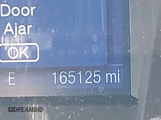 2013 Ford Taurus SEL with VIN 1FAHP2E8XDG191132, listed as a IAAI auction lot 41833542 with 165,125 mi miles. Bid and sale history available at carsss.com. Image 15.