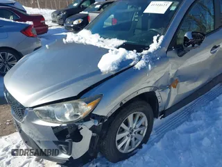 2013 Mazda CX-5 Touring with VIN JM3KE2CE7D0129623, listed as a IAAI auction lot 41344623 with 147,025 mi miles. Bid and sale history available at carsss.com. Image 6.