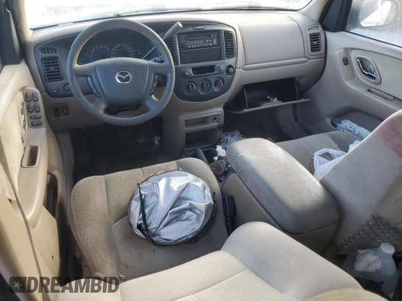 2002 Mazda Tribute LX with VIN 4F2YU09182KM09244, listed as a Copart auction lot 76758954 with Not Provided miles and Non Repairable. Bid and sale history available at carsss.com. Image 8.