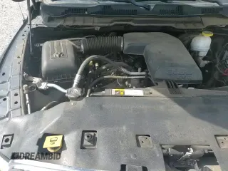 2018 Ram 1500 SLT z VIN 1C6RR6GG8JS334390, wystawiony jako Copart lot #66492545 z przebiegiem 74 353 mil mil oraz Szkoda całkowita • Salvage title. Historia ofert i sprzedaży dostępna na DreamBid. Obrazek 13.