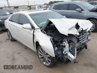 2014 Cadillac XTS Luxury with VIN 2G61M5S35E9303899, listed as a IAAI auction lot 41630891 with 1 mi miles. Bid and sale history available at carsss.com. Image 1.