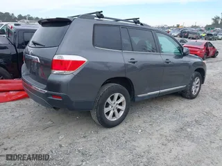2013 Toyota Highlander with VIN 5TDZK3EH4DS137768, listed as a IAAI auction lot 41399693 with 179,372 mi miles. Bid and sale history available at carsss.com. Image 4.