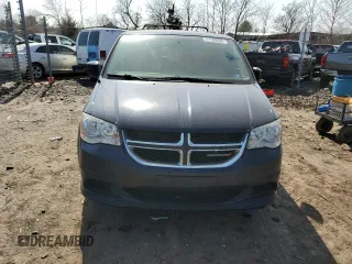 2016 Dodge Grand Caravan SXT with VIN 2C4RDGCGXGR160870, listed as a Copart auction lot 47705295 with 214,215 mi miles and Clean Title. Bid and sale history available at DreamBid. Image 5.