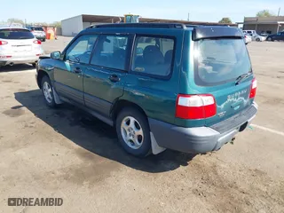 2001 Subaru Forester L with VIN JF1SF63561G719978, listed as a IAAI auction lot 41993814 with 208,781 mi miles. Bid and sale history available at carsss.com. Image 3.