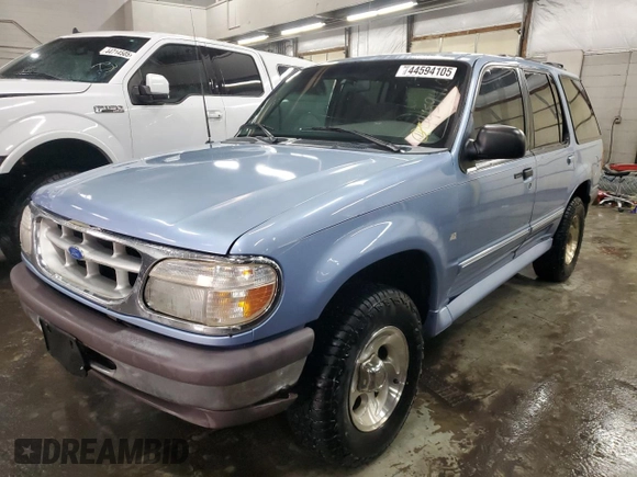 1997 Ford Explorer XLT with VIN 1FMDU35P8VZB98855, listed as a Copart auction lot 44594105 with 210,155 mi miles and Salvage title. Bid and sale history available at DreamBid. Image 1.