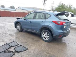 2016 Mazda CX-5 Sport with VIN JM3KE4BY5G0727608, listed as a IAAI auction lot 41975279 with 95,817 mi miles and . Bid and sale history available at carsss.com. Image 3.