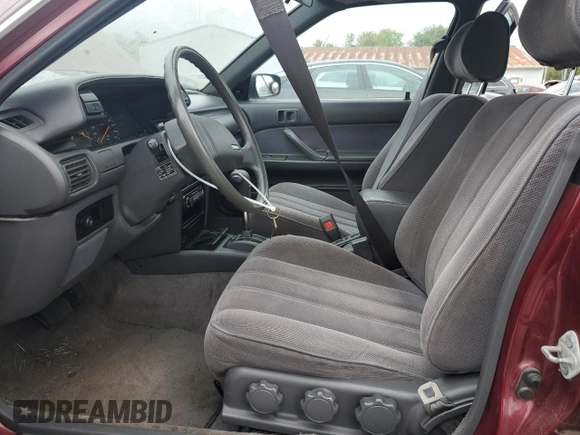 1991 Toyota Camry DLX z VIN 4T1SV21E0MU450578, wystawiony jako Copart lot #73990024 z przebiegiem 149 342 mil mil oraz Czysty tytuł • Clean title. Historia ofert i sprzedaży dostępna na DreamBid. Obrazek 7.