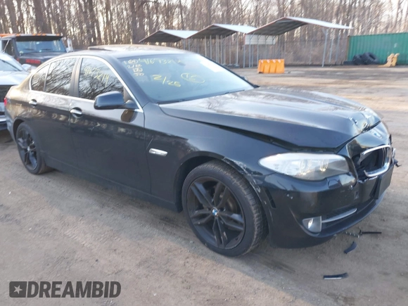 2013 BMW 5 Series 528i xDrive with VIN WBAXH5C58DD107515, listed as a IAAI auction lot 41673214 with 115,726 mi miles. Bid and sale history available at carsss.com. Image 1.
