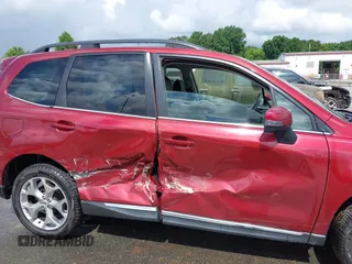 2017 Subaru Forester Touring z VIN JF2SJAWC8HH551644, wystawiony jako IAAI lot #42233209 z przebiegiem 108 199 mil mil oraz . Historia ofert i sprzedaży dostępna na DreamBid. Obrazek 13.