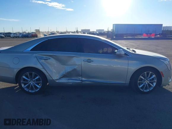 2014 Cadillac XTS Luxury z VIN 2G61N5S3XE9298471, wystawiony jako IAAI lot #41069292 z przebiegiem 92 112 mil mil oraz . Historia ofert i sprzedaży dostępna na DreamBid. Obrazek 12.