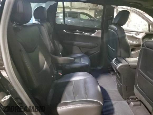 2020 Cadillac XT6 FWD Premium Luxury with VIN 1GYKPCRSXLZ154638, listed as a Copart auction lot 57439835 with 142,435 mi miles and Salvage title. Bid and sale history available at DreamBid. Image 11.