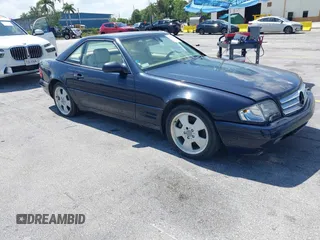 1999 Mercedes-Benz SL 500 z VIN WDBFA68F4XF177224, wystawiony jako IAAI lot #42296230 z przebiegiem 221 810 mil mil oraz . Historia ofert i sprzedaży dostępna na DreamBid. Obrazek 1.