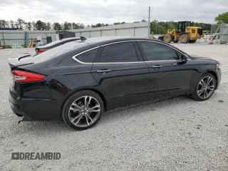2019 Ford Fusion Titanium with VIN 3FA6P0D95KR184147, listed as a Copart auction lot 52968885 with 122,170 mi miles and Clean Title. Bid and sale history available at carsss.com. Image 3.