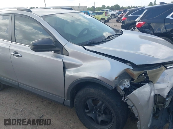 2018 Toyota RAV4 LE with VIN 2T3BFREV8JW758553, listed as a IAAI auction lot 42539300 with 116,337 mi miles and . Bid and sale history available at DreamBid. Image 1.
