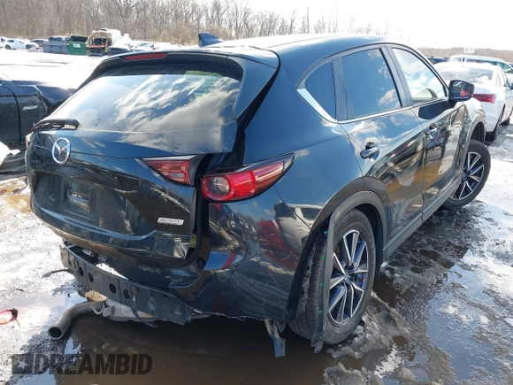 2018 Mazda CX-5 Touring with VIN JM3KFBCM2J0451828, listed as a IAAI auction lot 41531728 with 88,939 mi miles. Bid and sale history available at carsss.com. Image 19.