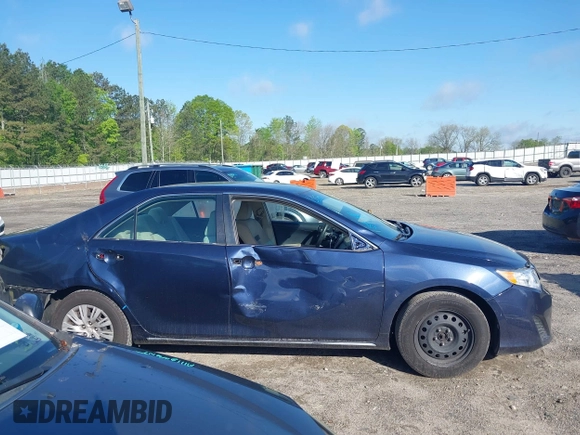 2014 Toyota Camry L with VIN 4T1BF1FK3EU820882, listed as a IAAI auction lot 42012278 with 174,000 mi miles and . Bid and sale history available at DreamBid. Image 14.