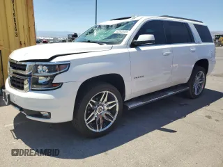 2016 Chevrolet Tahoe LT with VIN 1GNSKBKC0GR144327, listed as a Copart auction lot 62563465 with 98,731 mi miles and Salvage title. Bid and sale history available at DreamBid. Image 1.