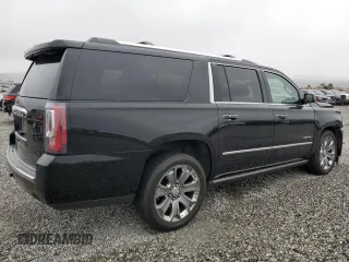 2016 GMC Yukon XL Denali with VIN 1GKS2HKJ1GR199710, listed as a Copart auction lot 49172615 with 261,856 mi miles and Salvage Title. Bid and sale history available at DreamBid. Image 3.