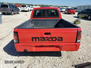 1991 Mazda B-Series Truck z VIN JM2UF3136M0148956, wystawiony jako Copart lot #47346325 z przebiegiem 71 241 mil mil oraz Szkoda całkowita • Salvage title. Historia ofert i sprzedaży dostępna na DreamBid. Obrazek 6.