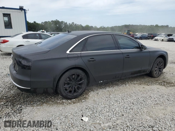 2012 Audi A8 с VIN WAURVAFD4CN017834, выставлен на аукционе Copart как лот 56951795 с пробегом 154 564 миль миль и Списание • Salvage title. История ставок и продаж доступна на DreamBid. Изображение 3.
