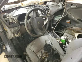 2012 Hyundai Accent GLS z VIN KMHCU4AE0CU225272, wystawiony jako Copart lot #49724155 z przebiegiem Nie podano mil oraz Szkoda całkowita • Salvage title. Historia ofert i sprzedaży dostępna na DreamBid. Obrazek 8.