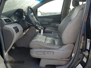 2012 Honda Odyssey Touring with VIN 5FNRL5H9XCB022284, listed as a Copart auction lot 82766824 with Not provided miles and Salvage title. Bid and sale history available at DreamBid. Image 7.