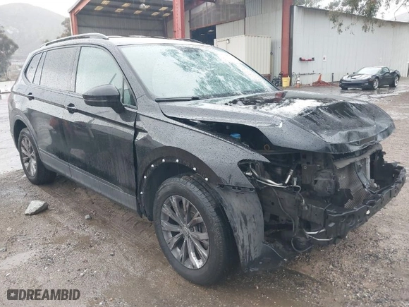 2018 Volkswagen Tiguan S with VIN 3VV1B7AX0JM101932, listed as a IAAI auction lot 41725112 with 143,780 mi miles. Bid and sale history available at carsss.com. Image 1.