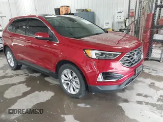 2020 Ford Edge Titanium z VIN 2FMPK4K98LBB39819, wystawiony jako IAAI lot #41947377 z przebiegiem 69 467 mil mil oraz . Historia ofert i sprzedaży dostępna na DreamBid. Obrazek 1.