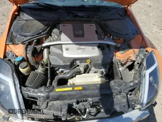 2007 Nissan 350Z Enthusiast z VIN JN1BZ34D37M506022, wystawiony jako Copart lot #52043755 z przebiegiem 147 099 mil mil oraz Szkody całkowita. Historia ofert i sprzedaży dostępna na DreamBid. Obrazek 12.